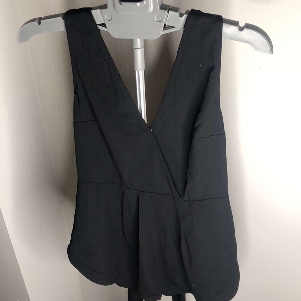 Black open back and tied tank top